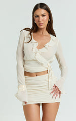 Kahrissa Top - Long Sleeve Ruffle Neck Top in Cream